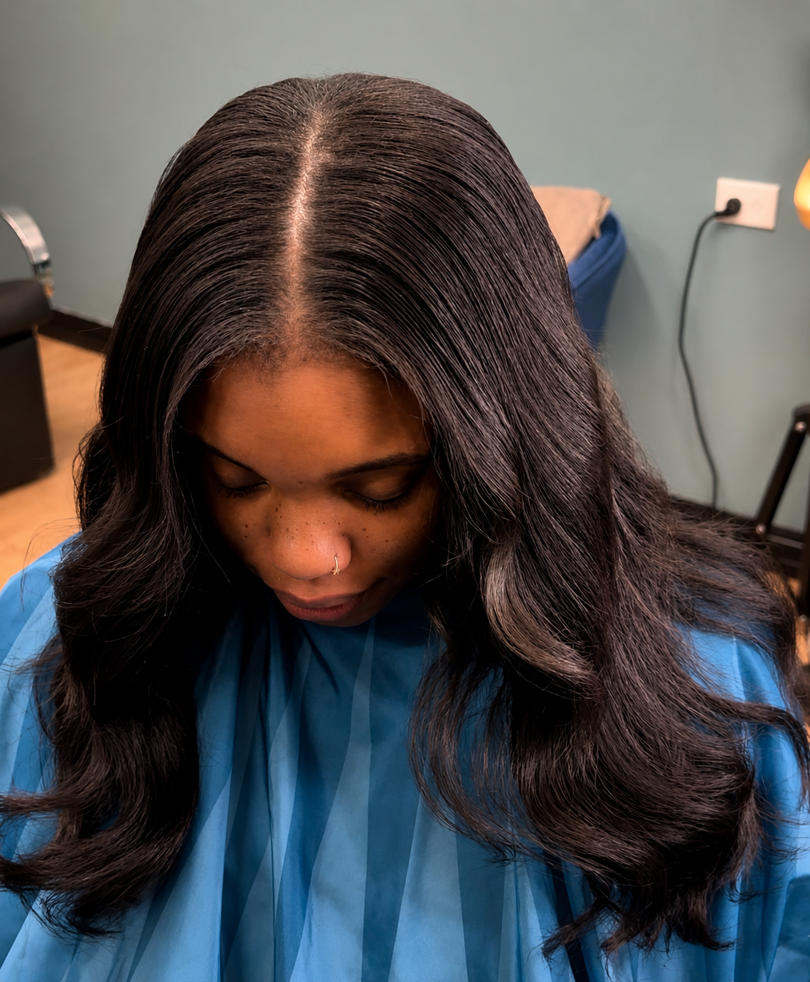 Tape-in install with soft bouncy waves and natural center part