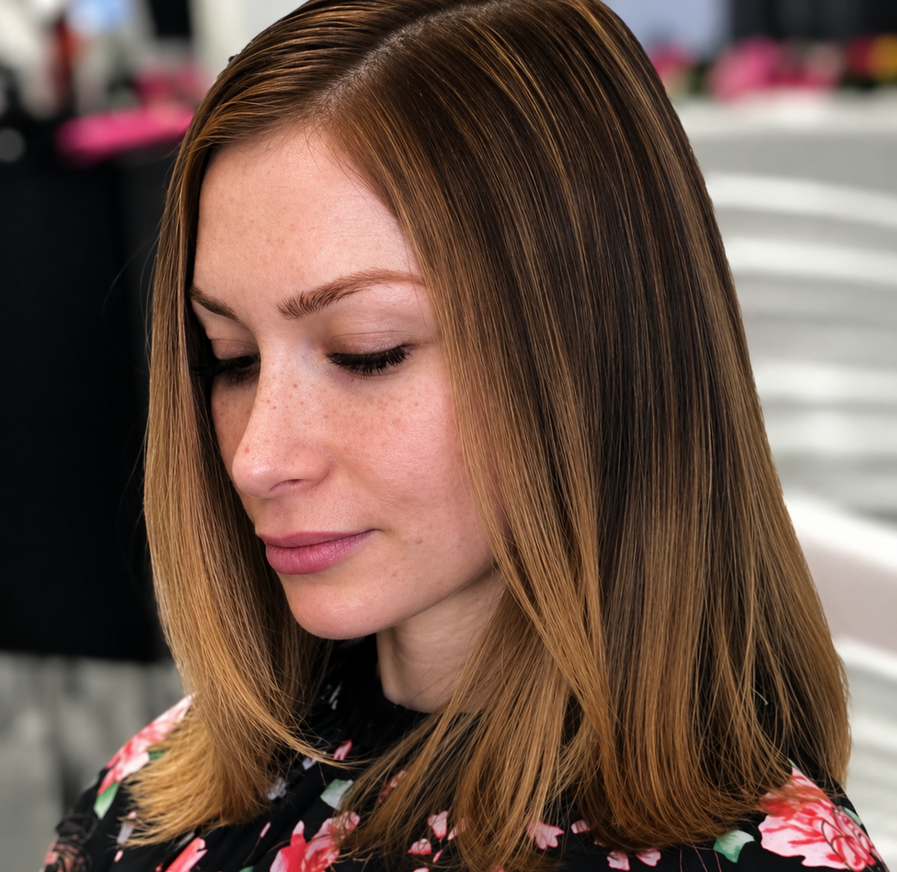 Smooth honey-blonde blowout with luminous golden tones